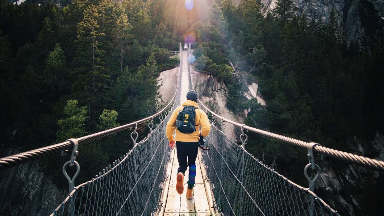 Man Running on Bridge