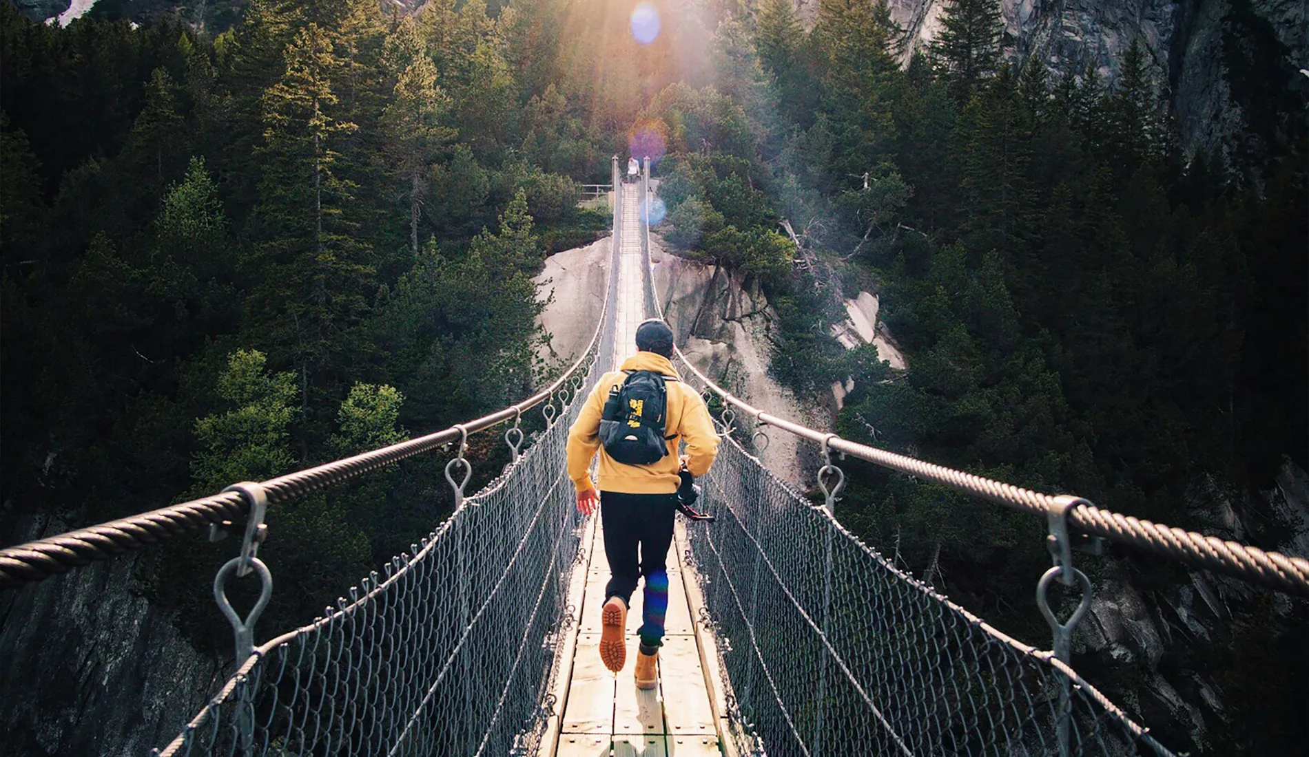 Man Running on Bridge